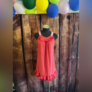 Peach mini dress with rope straps.